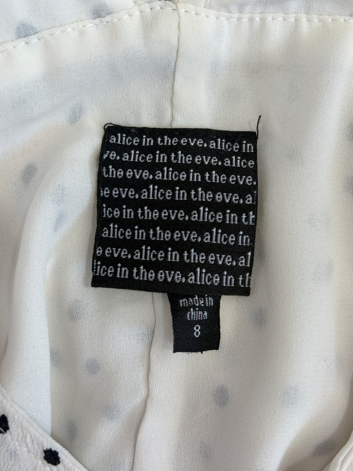 Alice in the Eve Polka Dot Wrap Midi Dress in cream & black – view 5 of 5